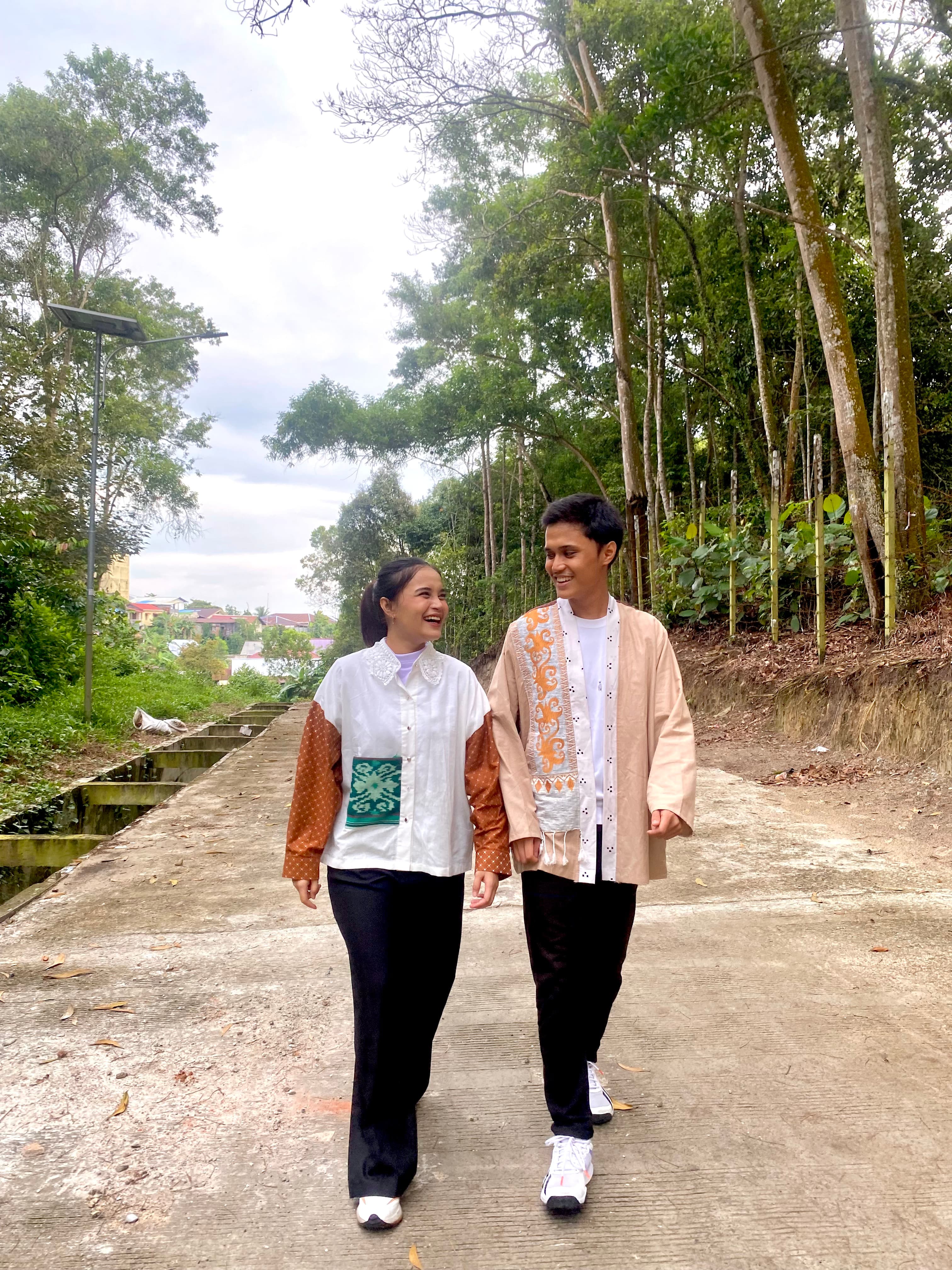 Couple wearing Batik outdoors